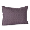 A dotted, circular embroidered pattern imparts a subtle sheen to this simple decorative pillow from Calvin Klein Home.