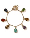 This vivid Lauren Ralph Lauren charm bracelet takes its inspiration from far flung locales, in textured gold plated metal. An array of multi hued stones add allure.