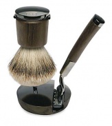 Timeless and elegant, the Acqua di Parma Deluxe Razor and Shaving Brush with Stand brings a touch of Italian craftsmanship to the daily ritual of shaving. The beautiful and functional shaving brush is made of premium hand-selected grey badger hair. The razor's wenge wood handle has been designed with a unique ergonomic shape and weighting system to allow for the easiest and most comfortable shave possible.