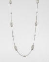 EXCLUSIVELY AT SAKS.COM. A brilliant piece with stylized oval stations on a delicate link chain. CrystalsRhodium-plated brassLength, about 36Lobster clasp closureImported 