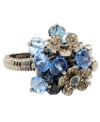 Flower power! Make a stylish impact with this chic cluster stretch ring from Betsey Johnson. Featuring a floral motif, it's adorned with faceted beads and sparkling crystals. Made in hematite tone mixed metal. Ring adjusts to fit finger.