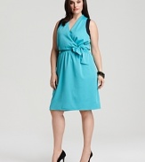 Trend-right color blocking makes a summer statement in Tahari Woman's flattering faux wrap dress.