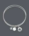 Be charmed by this adorable Studio Silver style. Two sterling silver bangles are held together by three, unique charms including a cut-out star, a simple circle, and a round glass accent. Approximate diameter: 2-1/2 inches.