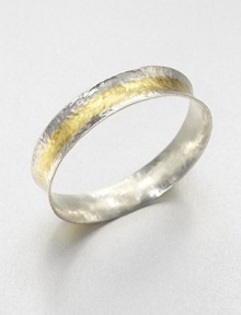 A concave design in sleek sterling silver and radiant 24k gold with a stunning hammered texture. Sterling silver24k goldSlip-on styleImported 