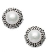 Dedicated to elegance. These beautiful cultured freshwater pearl earrings (8-1/2-9 mm) sit in an intricately-engraved sterling silver setting. Approximate diameter: 6/8 inch.