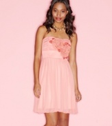 Trixxi pairs rosette applique with soft chiffon on a sweet dress that's a style maven's delight!