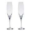 Orrefors Intermezzo Blue Collection designed by Erika Lagerbielke. From the name synonymous with unique and luxurious art glass, Orrefors' Intermezzo Blue has a distinct teardrop of blue in the stem.