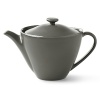 A highly glossed surface and unusual contours make this Pebblestone teapot an artful addition to any table.