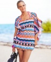 Go from the sand to the streets in this chic printed tunic from Kenneth Cole Reaction!