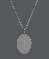 Express your sense of faith and style simultaneously! This polished, oval pendant highlights an intricate, engraved cross in sterling silver. Approximate length: 18 inches. Approximate drop: 3/4 inch.