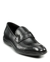 Stylish comfort. This leather slip-on loafer has detailed stitching and a cut-out detail at the middle.