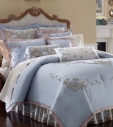 A blue, white and taupe floral pattern embellished this Rutledge decorative pillow from Lenox. Finished with pleated trim and ties on the end for a truly classic air.