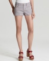 These MARC BY MARC JACOBS denim shorts are the casual-cool look of the season, lending an ease to your weekend in a loose fit and a subtle go-with-all shade.