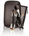 Brush up on beauty this holiday season with this must-have Deluxe Travel Brush Collection for flawless makeup application. Perfect for the on-the-go woman, this sleek brush case features a hard shell design with 2 pockets and a removable mesh pouch that houses a combination of 9 professional brushes for face, cheeks, eyes and brows. Set includes: Secret Camouflage powder; All Over Eye Colour/pony tail; Flat Eye Liner/smudge; Brow Definer/brow grooming and a full-size Cheek Colour brush.