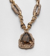 An intricately engraved bronze link chain with a faceted smoky quartz pendant inspired by the designer's love of nature's bounty. BronzeSmoky quartzLength, about 27.5Pendant size, about 2Toggle closureMade in USA