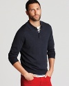 A classic polo design is rendered in uniquely soft merino wool for a plush addition to your sweater wardrobe.