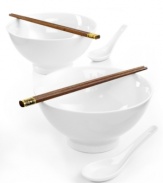 Give ramen its due with the sleek BIA Noodles 2 Go set, featuring white porcelain bowls and spoons designed specifically for slurping hot noodle soups. With wooden chopsticks for picking out all your favorite components.