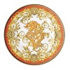 The most legendary figure of Asian mythology, the red dragon rises majestically from this fabulously opulent dinnerware from Rosenthal Meets Versace, conveying all its might and glory. Each piece features ornate golden baroque patterns and four small medallions representing the sun, and the Versace medusa decorates the background.