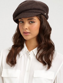 A warm, wool style in a slouchy design with logo detail.WoolAdjustable inner bandBrim, about 2Pindot linedSpot cleanImported