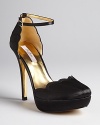 Scalloped edging and slim ankle straps define these Ted Baker platform pumps that take evening elegance to new heights.