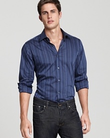 The blue's never felt so good. This sleek BOSS Black stripe shirt lights up your off-hours look.