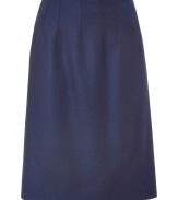 Quietly elegant and effortlessly cool, Jil Sanders dark blue wool skirt ups the ante on ladylike luxe - Classic slim, A-line silhouette - In a soft, medium-weight virgin wool and angora blend - Knee-length style with decorative seams at waist and side zip - Polished and preppy chic, ideal for pairing with a slim-cut blouse or a button down and long cardigan or pullover