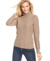 Karen Scott's soft sweater offers the coziest look of the season, thanks to cable-knit at the front and a ribbed turtleneck collar.