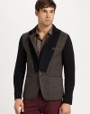 The next level of stylish suiting separates, this trend-setting design features a chevron tweed pattern with contrasting collar and sleeves and leather elbow patch detail for a surprising finishing touch.Button-frontChest, waist welt pocketsRear ventAbout 27 from shoulder to hem50% polyamide/50% woolDry cleanImported