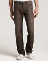 7 For All Mankind's Standard jean in a Buellton wash, featuring a straight leg, lower rise, and the signature squiggle stitching on the back pockets.