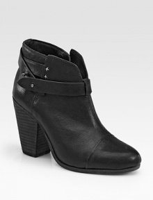 Soft leather staple has a high, stacked heel and a wrap-around buckle strap. Stacked heel, 3½ (90mm)Leather upperLeather lining and solePadded insoleImported