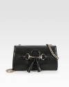 Saddle-soft luxe leather in flap-front silhouette finished with polished hardware and tassel accents.Chain shoulder strap, 17 dropFlap closureOne inside open pocketLeather9W X 5H X 1½DMade in Italy