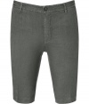 Stylish Bermuda short in fine, dark grey linen - Soft and lightweight material - Belt loops and button closure - Pockets at sides and welt pockets at rear - Flattering crease detail at thighs - Slim cut, hits above knee - Relaxed yet elegant and classically cool - Pair with a t-shirt, a polo or a button down