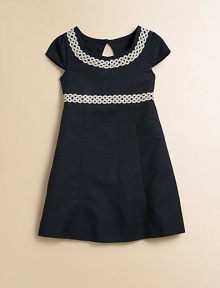 Dainty lace trim, cap sleeves and princess seaming make this woven frock a little girl's wardrobe must-have.ScoopneckCap sleevesBack keyhole button and zipperWaistband with lace trimPrincess seamsFlared skirtFully linedCottonMachine washImported