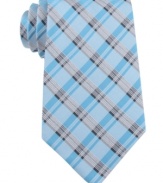 Turn up the volume on your work wear. This plaid tie from Calvin Klein pumps up any suit.