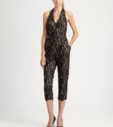 Delicate lace offers a ladylike take on the classic jumpsuit, finished with a chic halter neckline and belted waist.Halter necklineTop-fit bodiceBelted waistAnkle zippersCenter back zipperAbout 50 from shoulder to hem59% nylon/41% cottonDry cleanImportedModel shown is 5'11 (180cm) wearing US size 4.