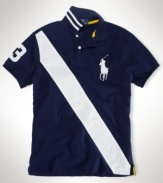 A regal-looking athletic favorite, this custom-fit polo is crafted in a breathable cotton mesh and accented with a dynamic sash across the front.