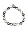 The new neutral. A gorgeous shade of gray illuminates Givenchy's glass pearl stretch bracelet, making it a versatile choice for 9 to 5 and beyond. Made in silver tone mixed metal, the stretch design lets it slip on and off both effortlessly and gracefully. Approximate length: 2-1/4 inches.