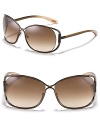 Tom Ford's oversized sunglasses with open temples add a modern element to your poolside style.