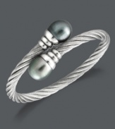 Up your elegance factor. A twisted stainless steel bangle with stunning Tahitian cultured freshwater pearl  ends  (10-11 mm) wraps itself delicately around your wrist. Approximate length: 8 inches.