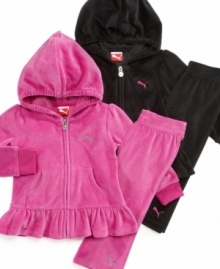 Keep her sporty look girlie with one of these ruffly jacket and pant sets from Puma.