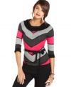 Swap out your usual striped shirt for this fun sweater by BCX. Chevron stripes in contrasting colors, a cowl neckline and a removable belt add shape and dimension to your style!