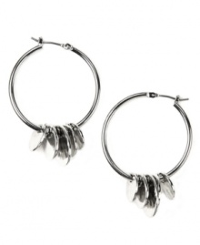 Shake up your style! Nine West's shaky hoop earrings will add a fresh--and fun!--edge to any casually chic outfit. Set in silver tone mixed metal. Approximate diameter: 1-1/4 inches.