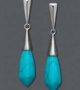 Silver bullets. A sterling silver post setting and teardrop-shaped turquoise (10 mm x 20 mm) combine on these sleek drop earrings. Approximate drop: 2 inches.