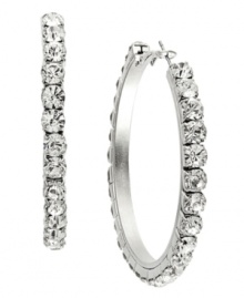 Hoops that pair effortlessly with your favorite blue jeans or your best cocktail dress. INC International Concepts' sparkling style incorporates round-cut crystals in a large silver tone mixed metal setting. Approximate diameter: 2 inches.