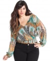 Leave them wanting more with Baby Phat's printed plus size top, featuring an open back.