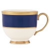 Inspired by privately commissioned presidential dinnerware, this fine china features stately navy bands and a gold border etched with patriotic stars.