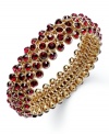 Slip on some alluring tones that add beauty to any look. Charter Club's chic bubble beaded style features siam glass accents in gold tone mixed metal. Bracelet stretches to fit wrist. Approximate diameter: 2-1/4 inches.