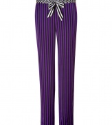 Ultra glamorous with their pattern mix and silky drape, Juicy Coutures striped pants are a seriously stylish take on sleepwear - White and black striped satin tie, black dotted waistband, side slit pockets, dotted lining at ankle for contrast printed cuffs - Straight leg - Wear with a cami and shearling-lined slippers