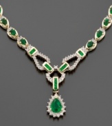 This exquisite royalty-inspired design presents emeralds (8-1/3 ct. t.w.) fully surrounded by diamonds (1-1/5 ct. t.w) in a dramatic 14k gold toggle-style drop necklace. Approximate length: 17 inches.