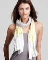 A large ombré scarf in soft jersey knit, the perfect complement to those chilly summer nights.